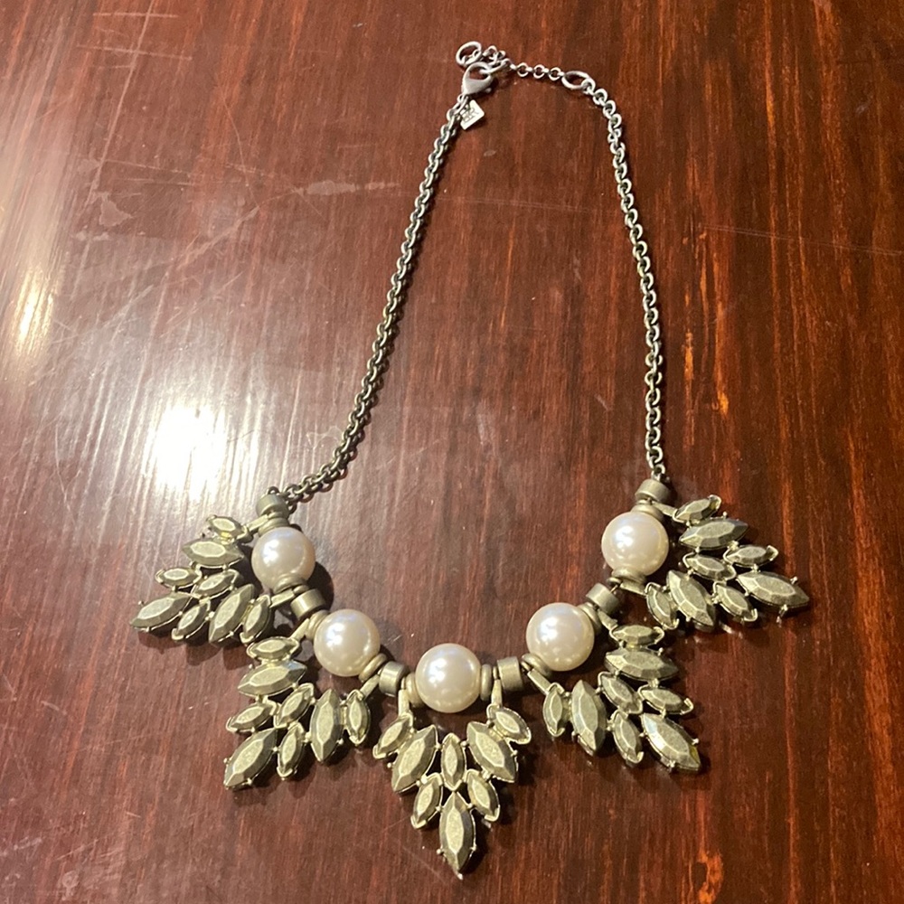 Silver large petal  with pearls necklace .